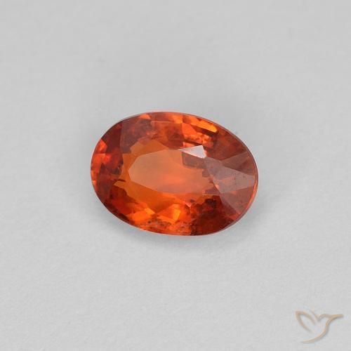 Saphir Orange feu naturelle ovale, 0.63 ct, VS