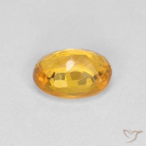 Saphir Or orange foncé naturelle ovale, 0.65 ct, VVS