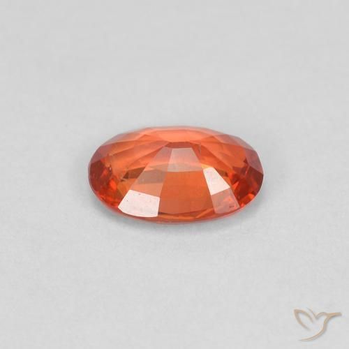 Saphir Orange rougeâtre naturelle ovale, 0.47 ct, VS