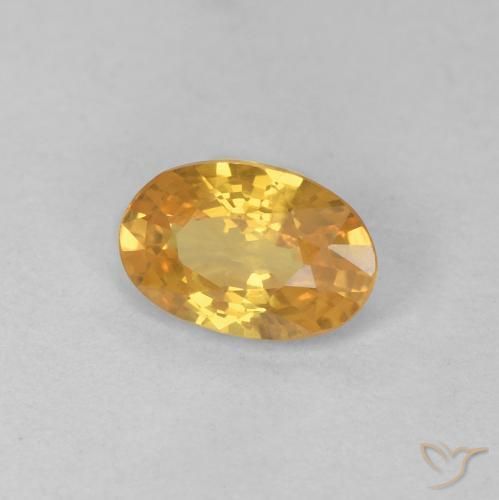 Saphir Orange doré profond naturelle ovale, 0.57 ct, VS