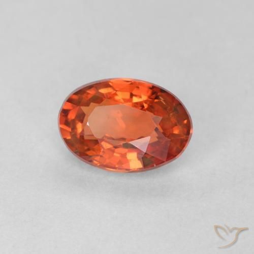 Saphir Orange rougeâtre naturelle ovale, 0.57 ct, VS