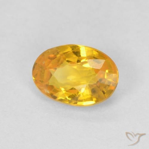Saphir Orange moyen naturelle ovale, 0.61 ct, VS