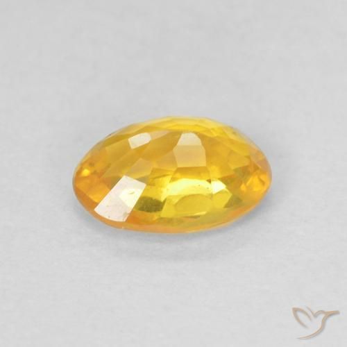 Saphir Orange moyen naturelle ovale, 0.61 ct, VS
