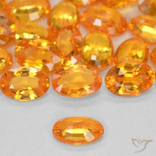 Saphir Orange vif naturelle ovale, 0.60 ct, VVS-VS