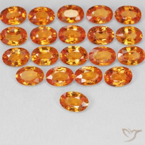 Saphir Orange vif naturelle ovale, 0.59 ct, VVS-VS