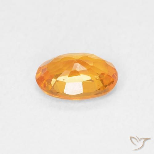 Saphir Orange vif naturelle ovale, 0.60 ct, VS