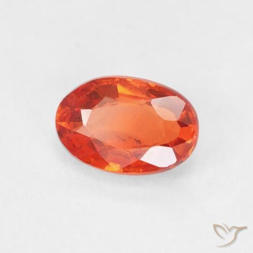 Saphir Orange rougeâtre naturelle ovale, 0.69 ct, VS