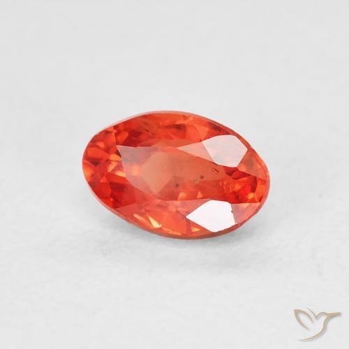Saphir Orange rougeâtre naturelle ovale, 0.68 ct, VS