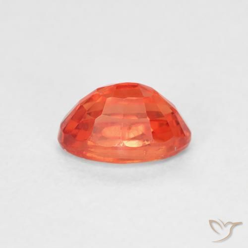 Saphir Orange rougeâtre naturelle ovale, 0.68 ct, VS