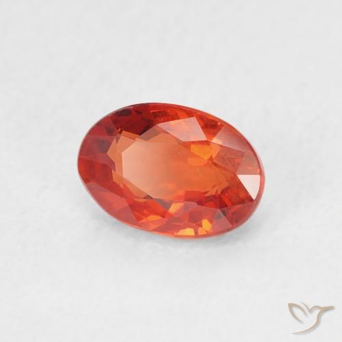 Saphir Orange rougeâtre naturelle ovale, 0.76 ct, VS