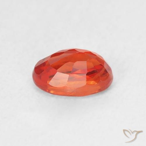 Saphir Orange rougeâtre naturelle ovale, 0.76 ct, VS