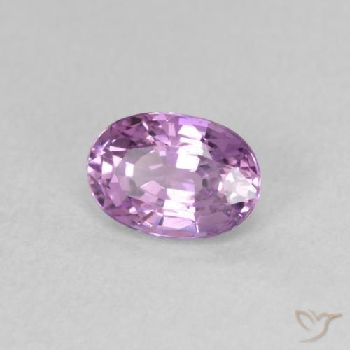 Saphir Pourpre rosâtre moyen naturelle ovale, 0.73 ct, VS