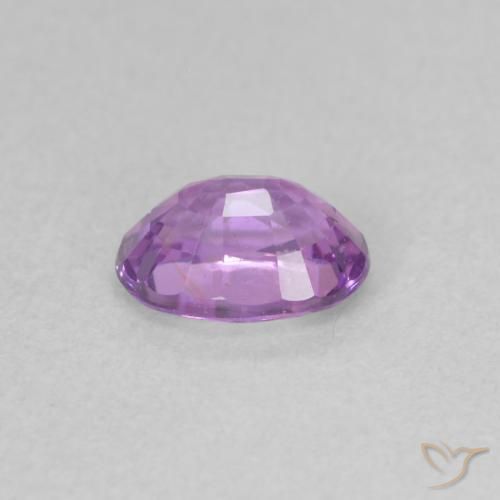 Saphir Pourpre rosâtre moyen naturelle ovale, 0.73 ct, VS
