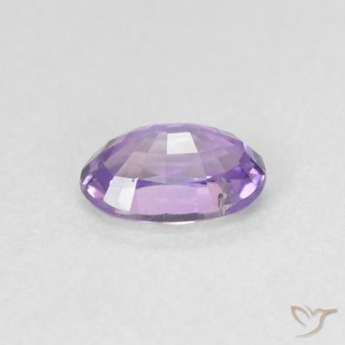 Saphir Violet foncé naturelle ovale, 0.60 ct, VVS-VS