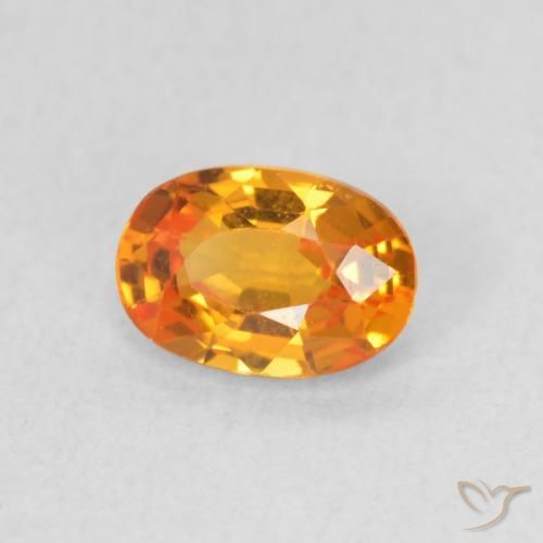 Saphir Orange vif naturelle ovale, 0.64 ct, VVS