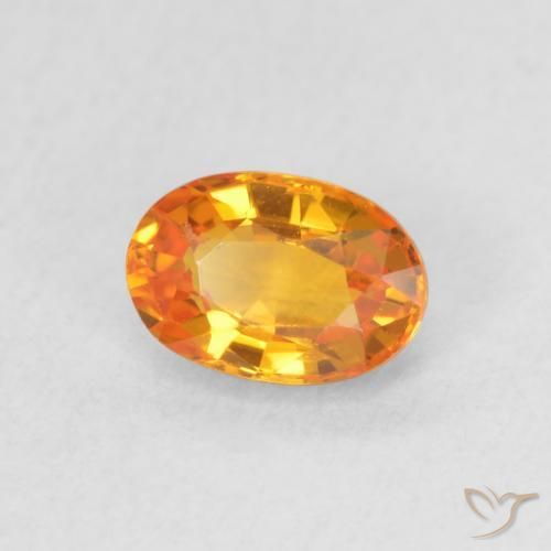 Saphir Orange vif naturelle ovale, 0.64 ct, VVS