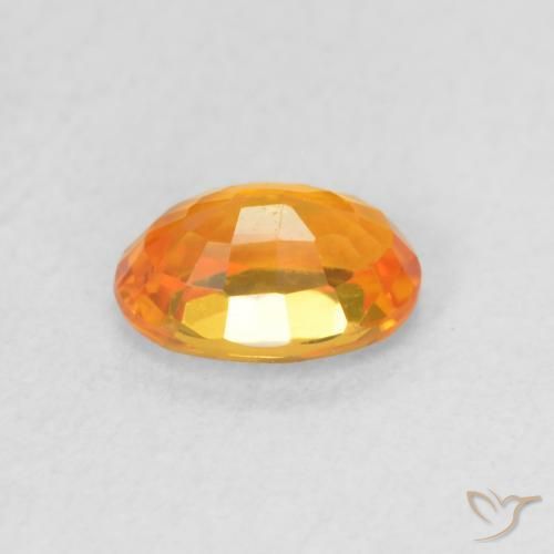 Saphir Orange vif naturelle ovale, 0.64 ct, VVS