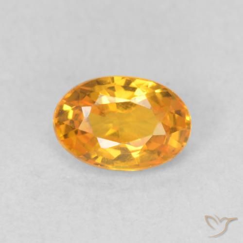 Saphir Doré-orange foncé naturelle ovale, 0.62 ct, VVS-VS