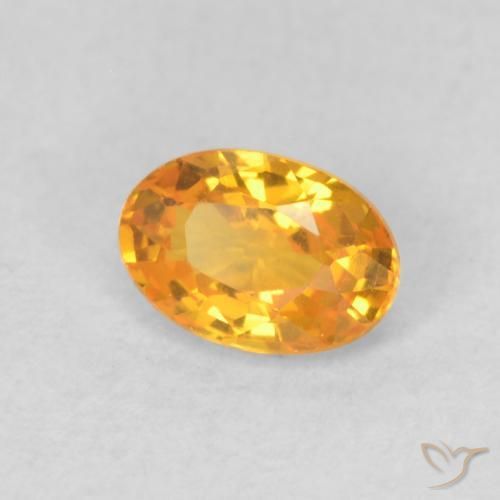 Saphir Doré-orange foncé naturelle ovale, 0.62 ct, VVS-VS