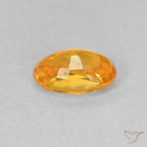 Saphir Doré-orange foncé naturelle ovale, 0.62 ct, VVS-VS