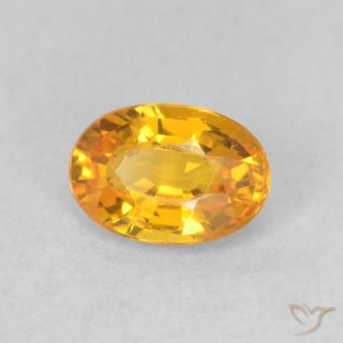 Saphir Or orange foncé naturelle ovale, 0.68 ct, VVS-VS