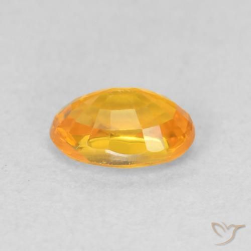 Saphir Or orange foncé naturelle ovale, 0.68 ct, VVS-VS