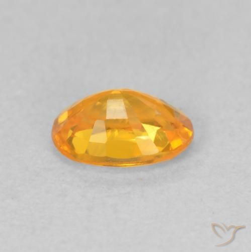 Saphir Or orange foncé naturelle ovale, 0.66 ct, VVS-VS