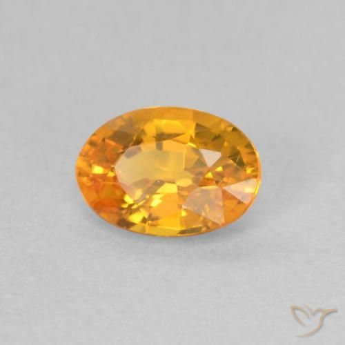 Saphir Abricot orange naturelle ovale, 0.59 ct, VS