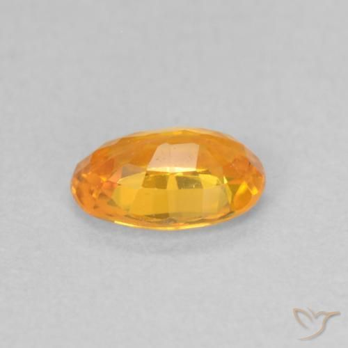 Saphir Orange moyen naturelle ovale, 0.62 ct, VS