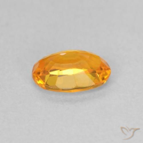 Saphir Orange vif naturelle ovale, 0.63 ct, VS