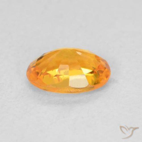 Saphir Orange vif naturelle ovale, 0.68 ct, VS
