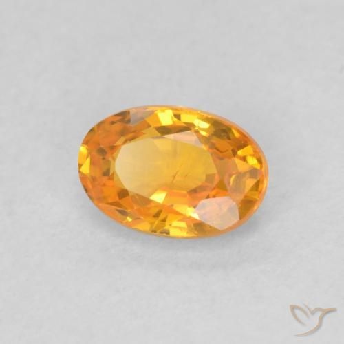 Saphir Orange vif naturelle ovale, 0.61 ct, VS