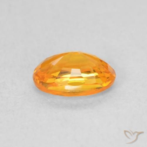 Saphir Orange vif naturelle ovale, 0.61 ct, VS