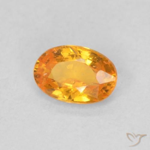 Saphir Orange vif naturelle ovale, 0.54 ct, VS