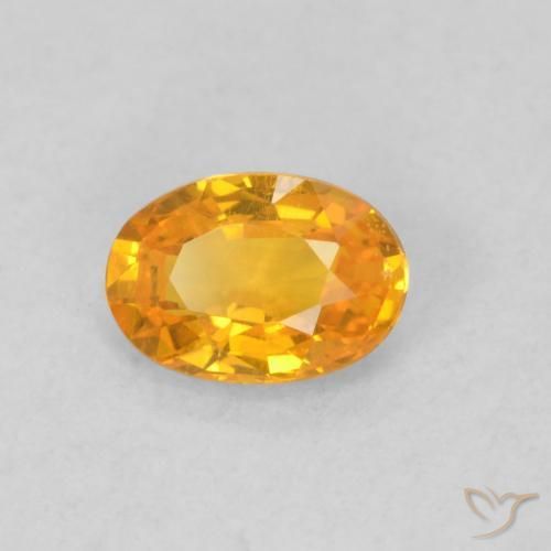 Saphir Abricot orange naturelle ovale, 0.62 ct, VS