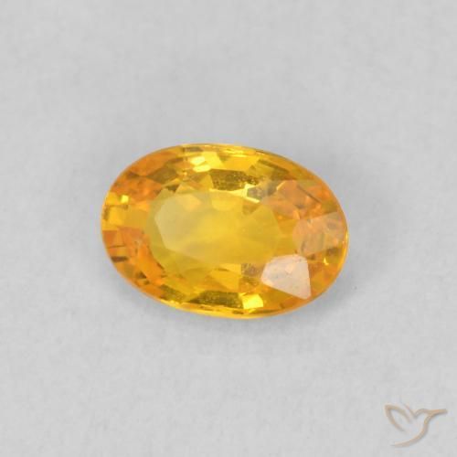 Saphir Orange vif naturelle ovale, 0.59 ct, VS