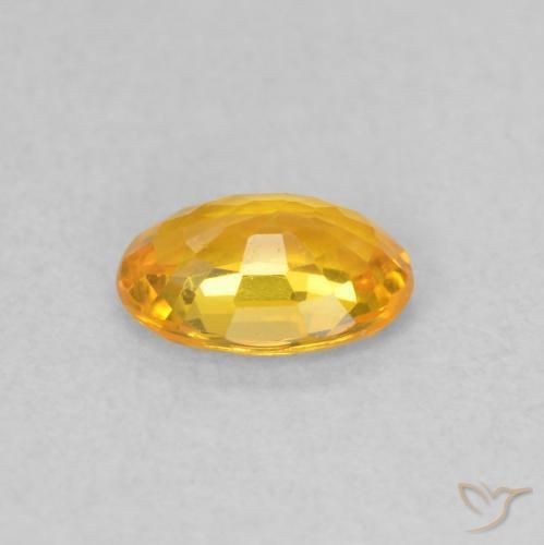 Saphir Orange vif naturelle ovale, 0.59 ct, VS