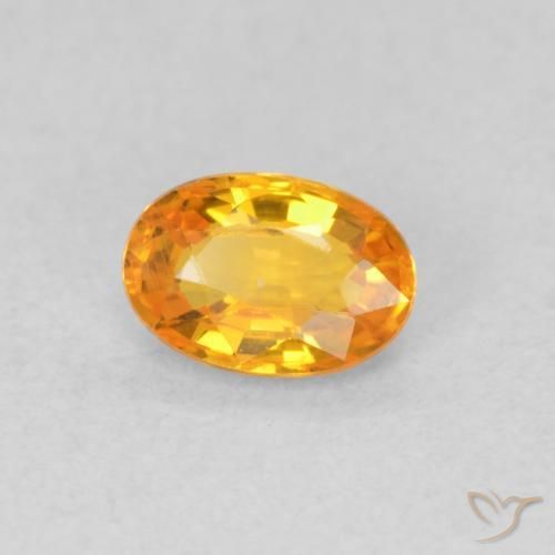 Saphir Orange vif naturelle ovale, 0.55 ct, VVS-VS