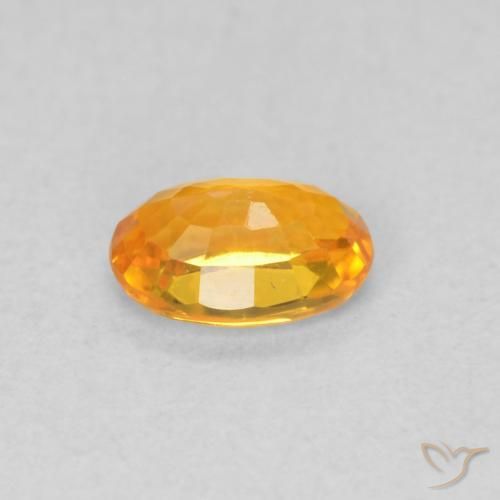 Saphir Orange vif naturelle ovale, 0.55 ct, VVS-VS
