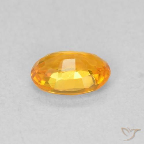 Saphir Orange vif naturelle ovale, 0.63 ct, VVS-VS
