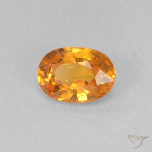 Saphir Orange vif naturelle ovale, 0.57 ct, VVS-VS