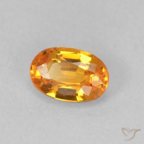 Saphir Orange moyen naturelle ovale, 0.64 ct, VVS
