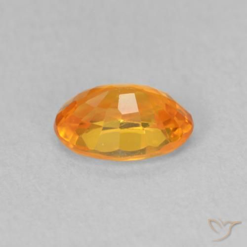 Saphir Orange vif naturelle ovale, 0.66 ct, VVS