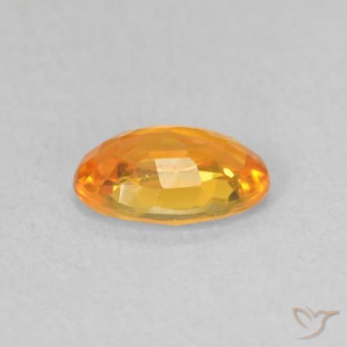 Saphir Orange vif naturelle ovale, 0.55 ct, VVS