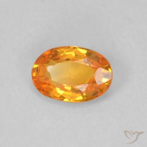 Saphir Orange vif naturelle ovale, 0.53 ct, VVS