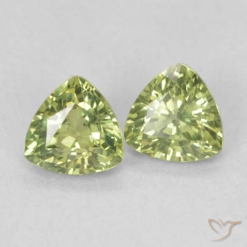 Shop natural 0.67ct Vert jaunâtre Saphir gems, Trillion, from Madagascar at GemSelect. In stock, global shipping!