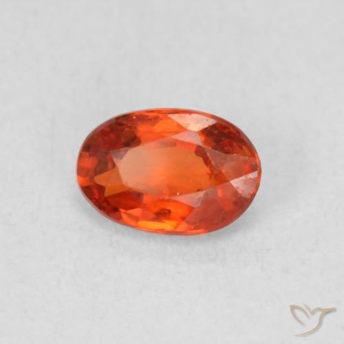 Saphir Orange chaud naturelle ovale, 0.62 ct, VS