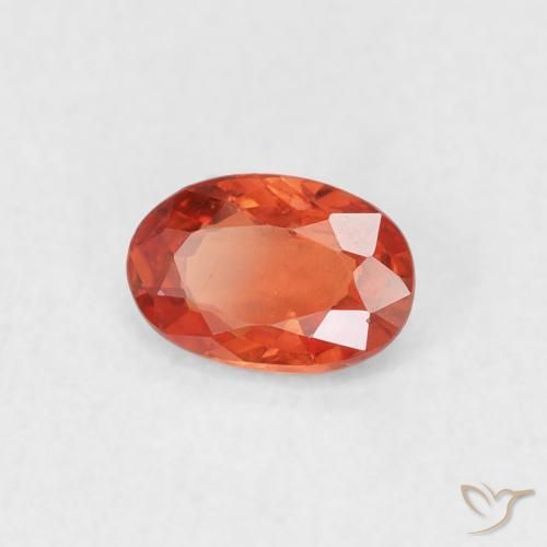 Saphir Orange rougeâtre naturelle ovale, 0.53 ct, VS