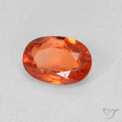 Saphir Orange rougeâtre naturelle ovale, 0.66 ct, VS