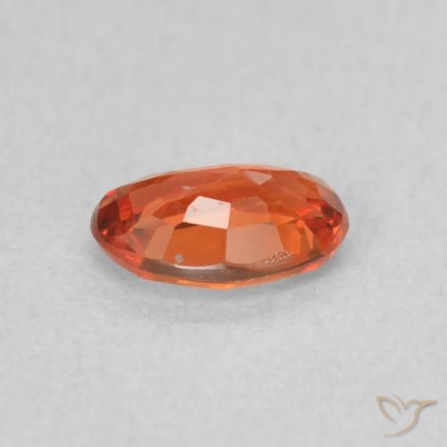 Saphir Orange rougeâtre naturelle ovale, 0.56 ct, VS